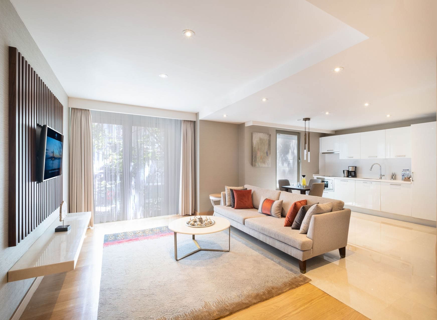 Two massage beds with a tray of amenities in Safira Spa & Fitness at CVK Park Prestige Suites Istanbul